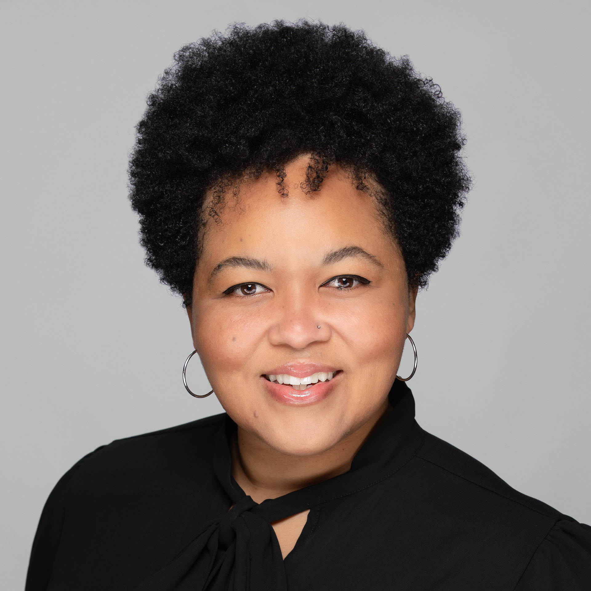 Dominique Simmons, founder of Plotted Work Studio and author of this guide